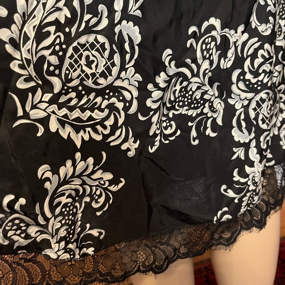 White House black market high low 100% silk skirt with lace trim. - Picture 3 of 8